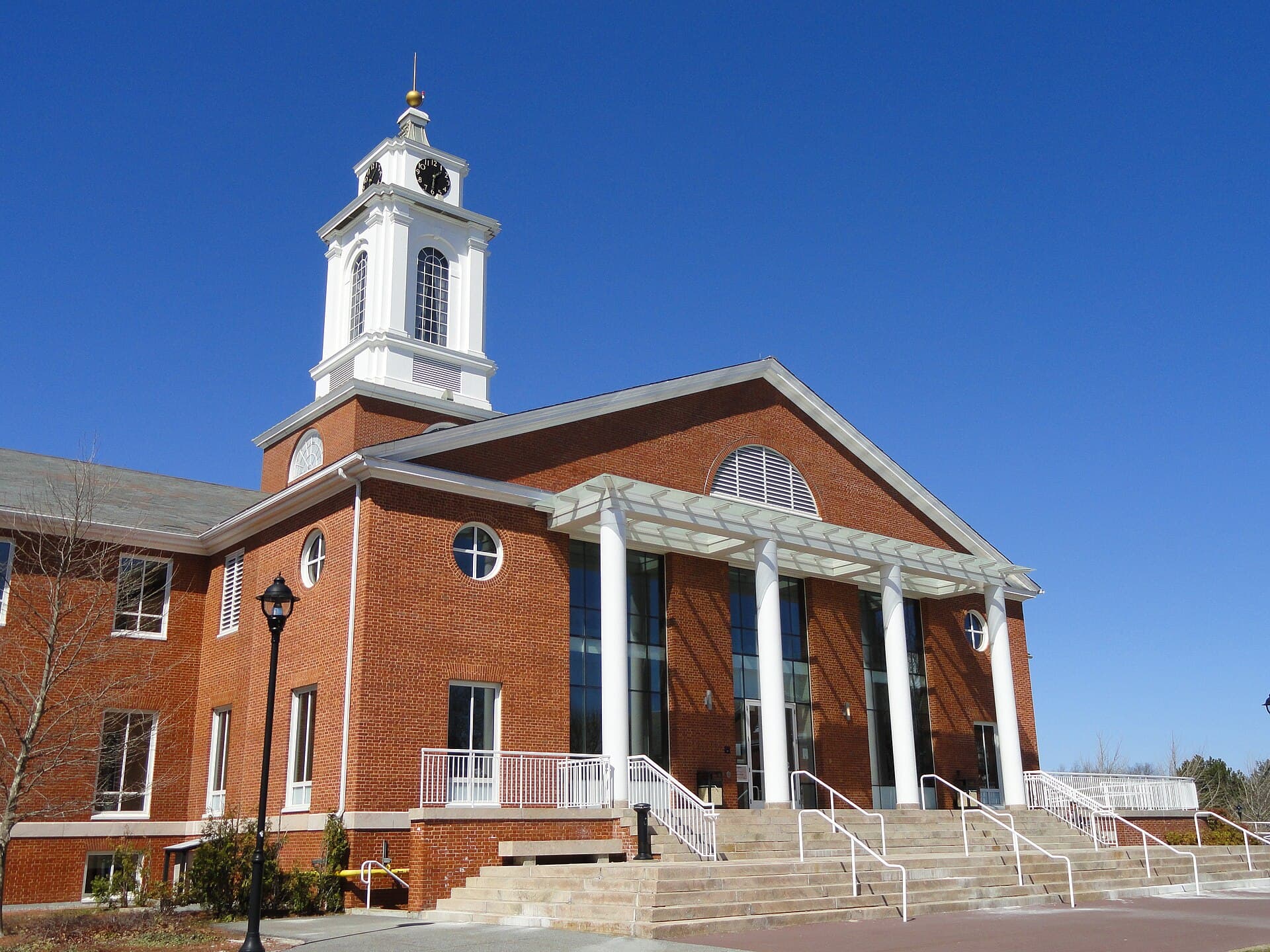 The Bentley Library and its white clock tower on the Bentley University campus